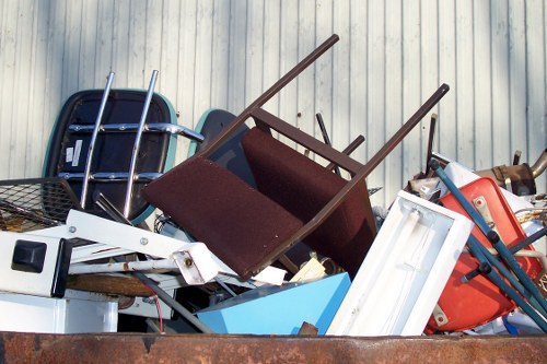 House clearance professionals sorting items in Archway home